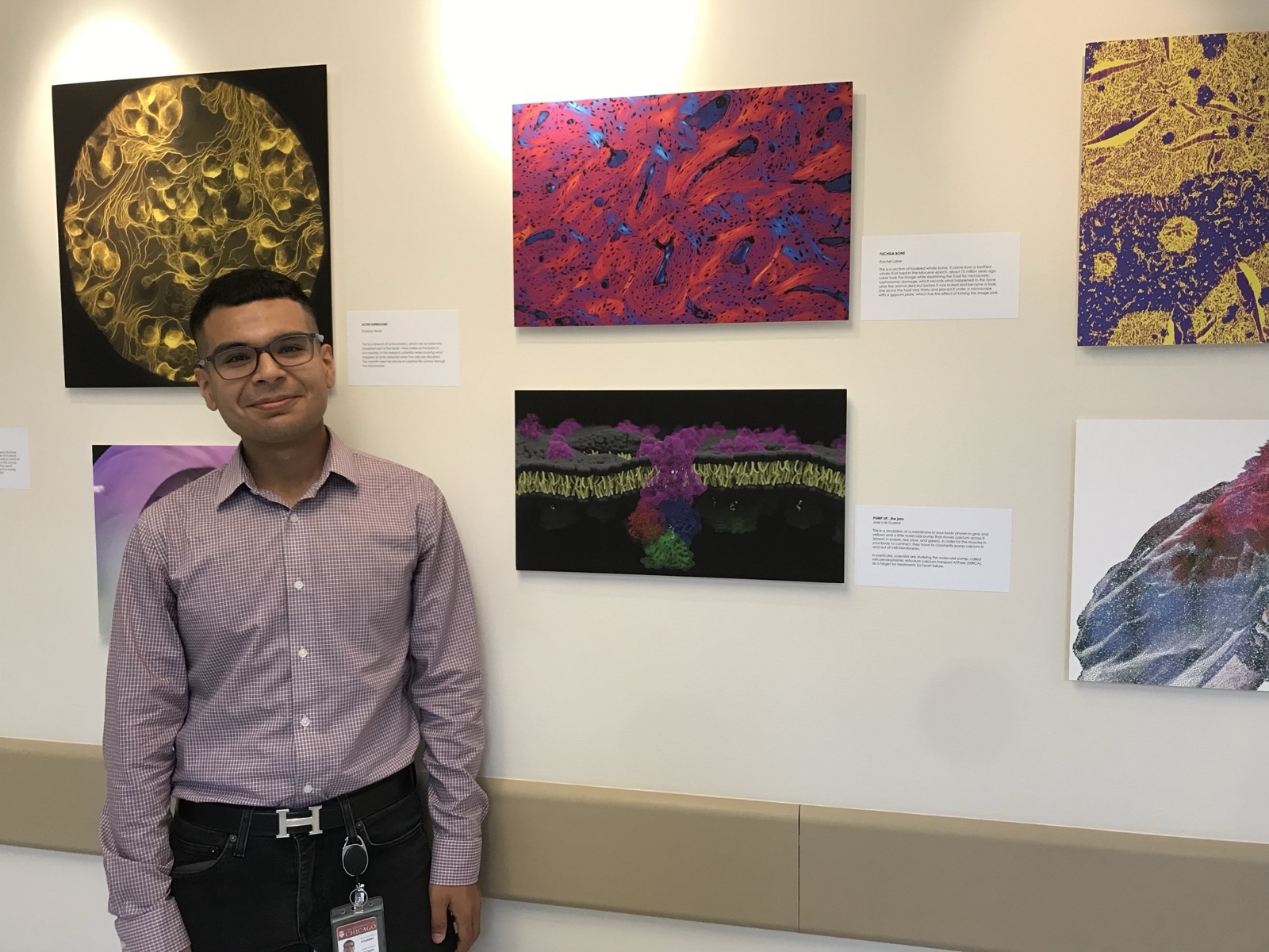 Jose standing with the SERCA science-as-art display
